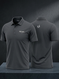 Gray polo shirt with branding on a dark background