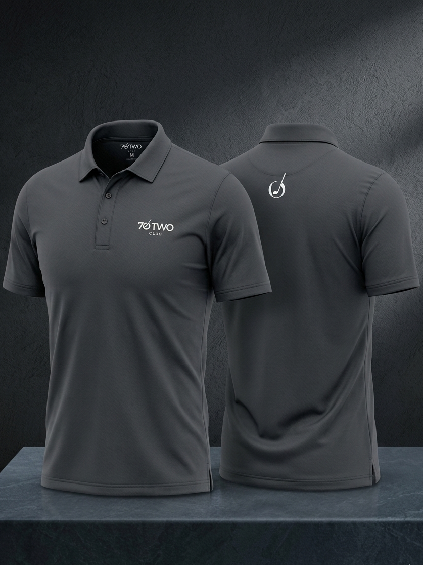 Gray polo shirt with branding on a dark background